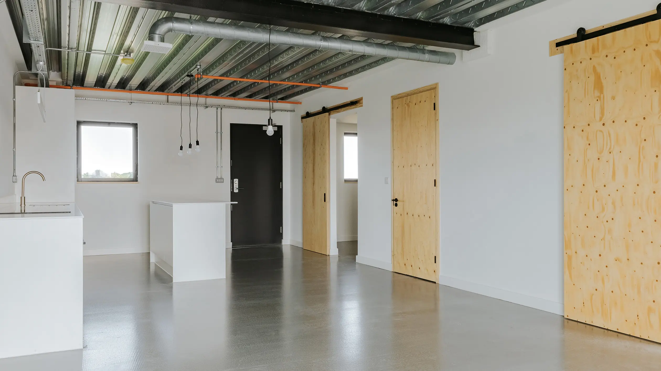 Timber-lined interior of a Citu home at the Climate Innovation District in Leeds