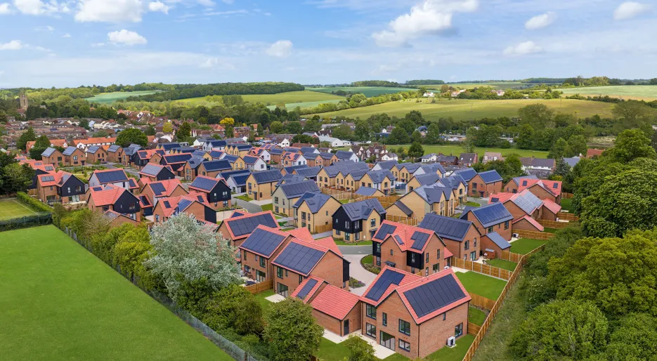 Aerial view of solar-panelled homes at Hollymead Square in Newport, Essex